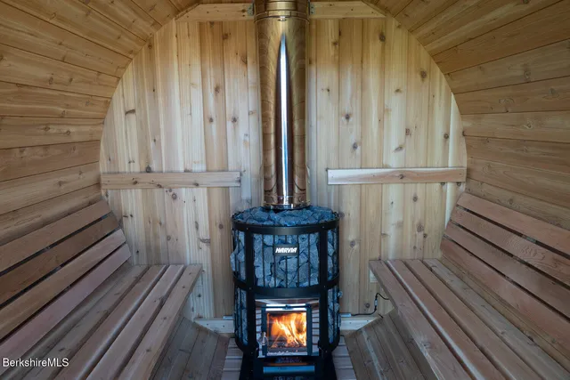 a view of a balcony with wooden floor and stairs