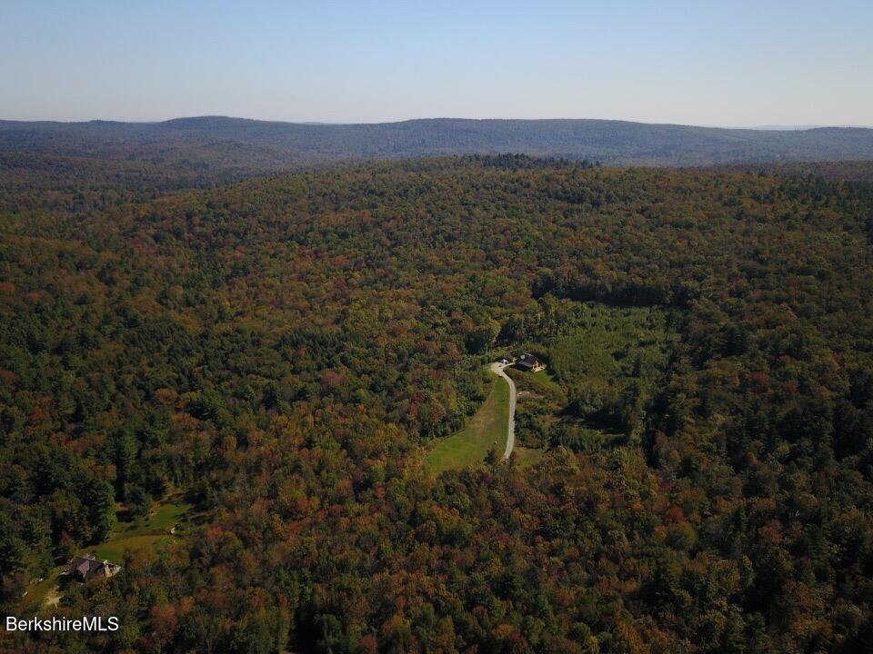 15 Stephanie Lane Peru, MA 01235 - Photo 29 of 37 a view of a lush green outdoor space with a mountain in the background