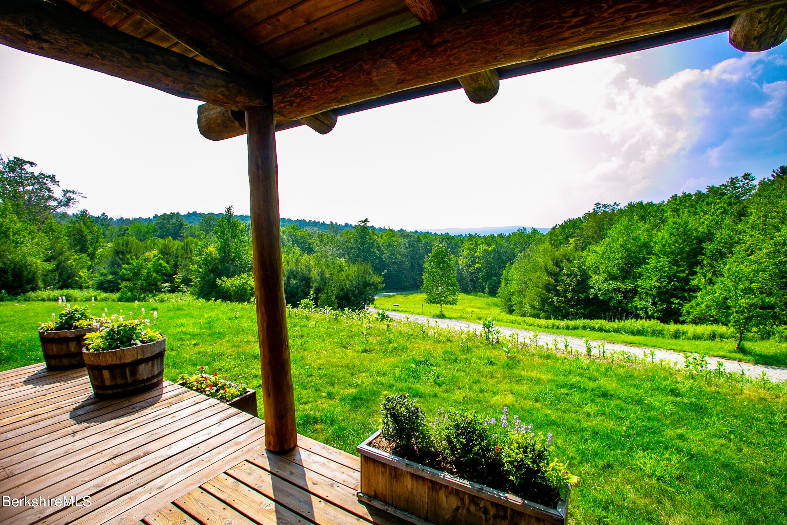 15 Stephanie Lane Peru, MA 01235 - Photo 33 of 37 a view of a porch with wooden floor and fence