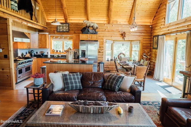 a living room with furniture and a table