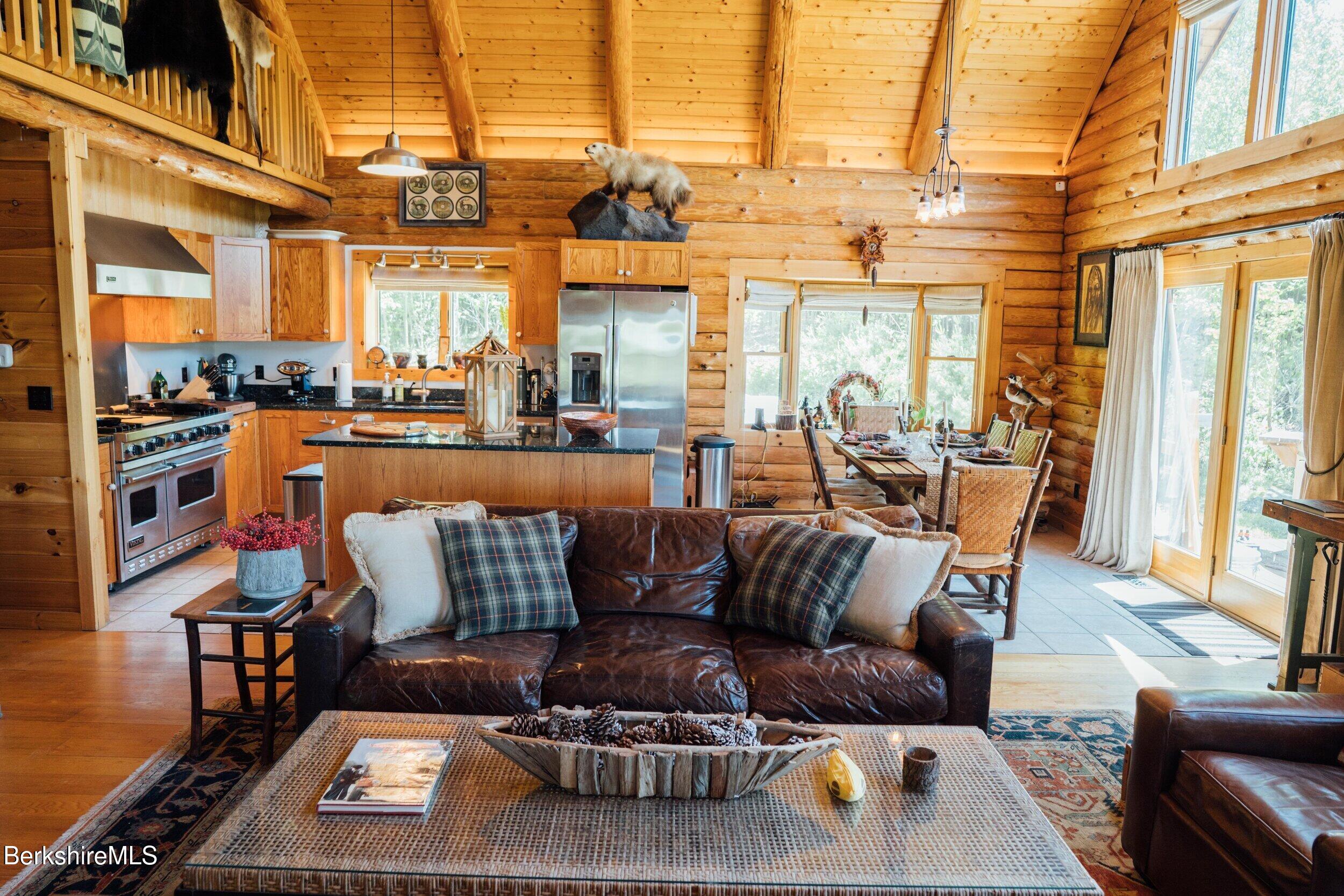 15 Stephanie Lane Peru, MA 01235 - Photo 6 of 37 a living room with furniture and a table