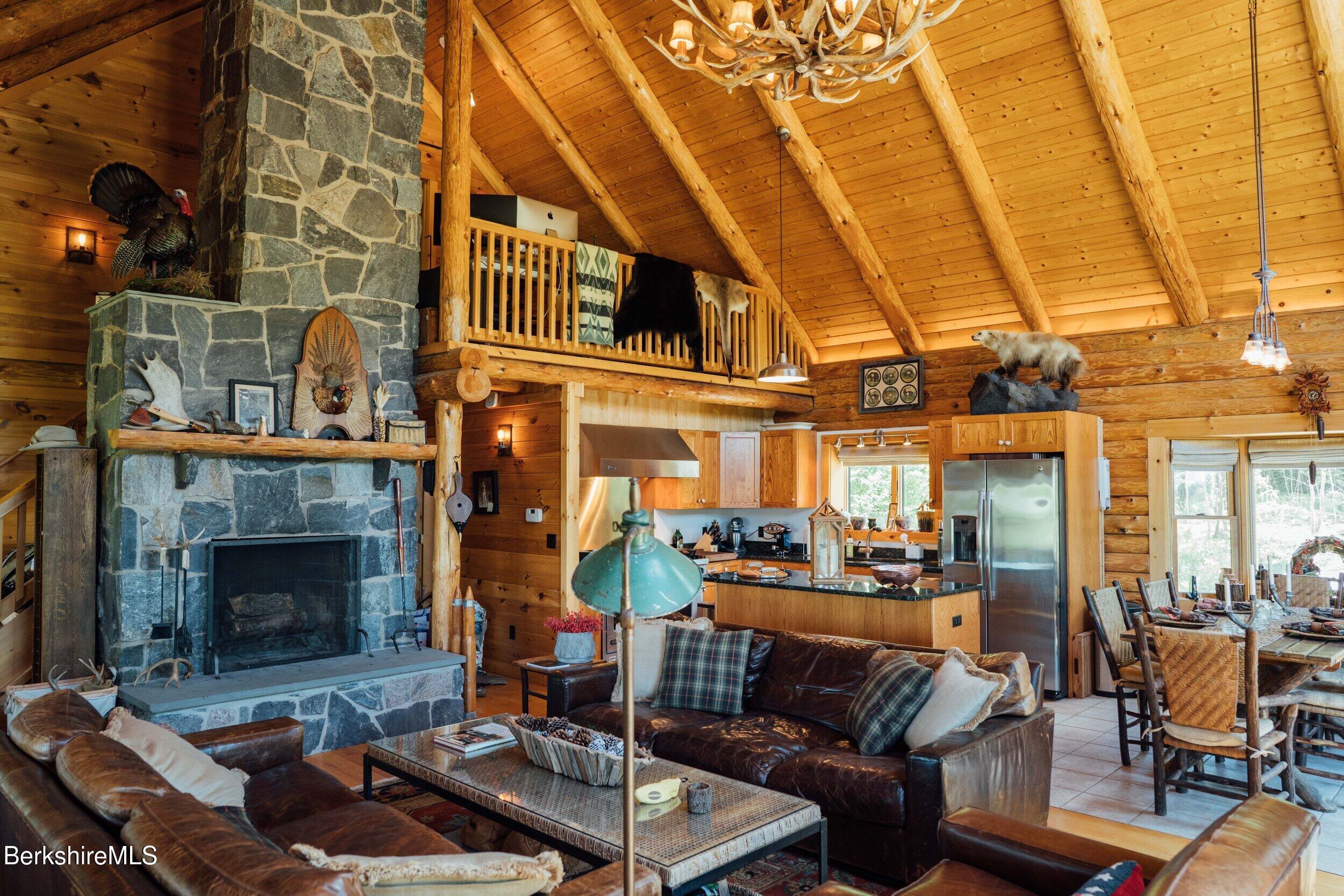 15 Stephanie Lane Peru, MA 01235 - Photo 7 of 37 a living room with furniture and a fireplace