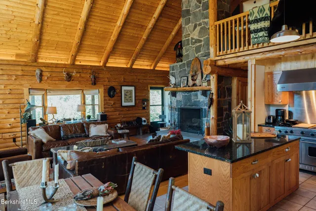 a kitchen with a sink and a stove top oven