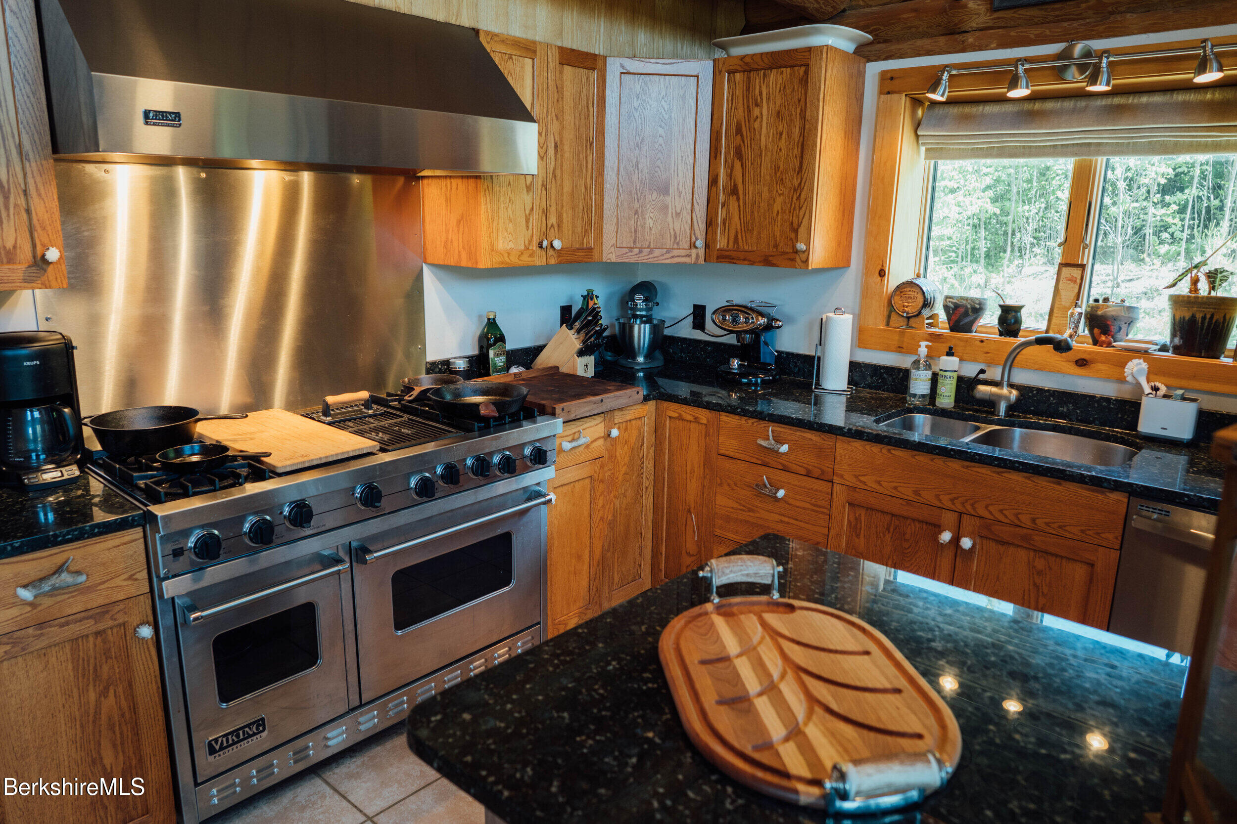 15 Stephanie Lane Peru, MA 01235 - Photo 10 of 37 a kitchen with stainless steel appliances a stove a sink and a microwave