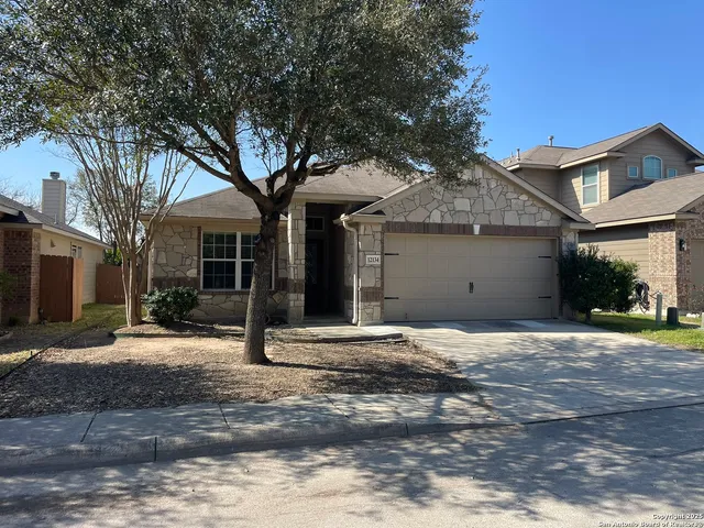 a house with yard in front of it
