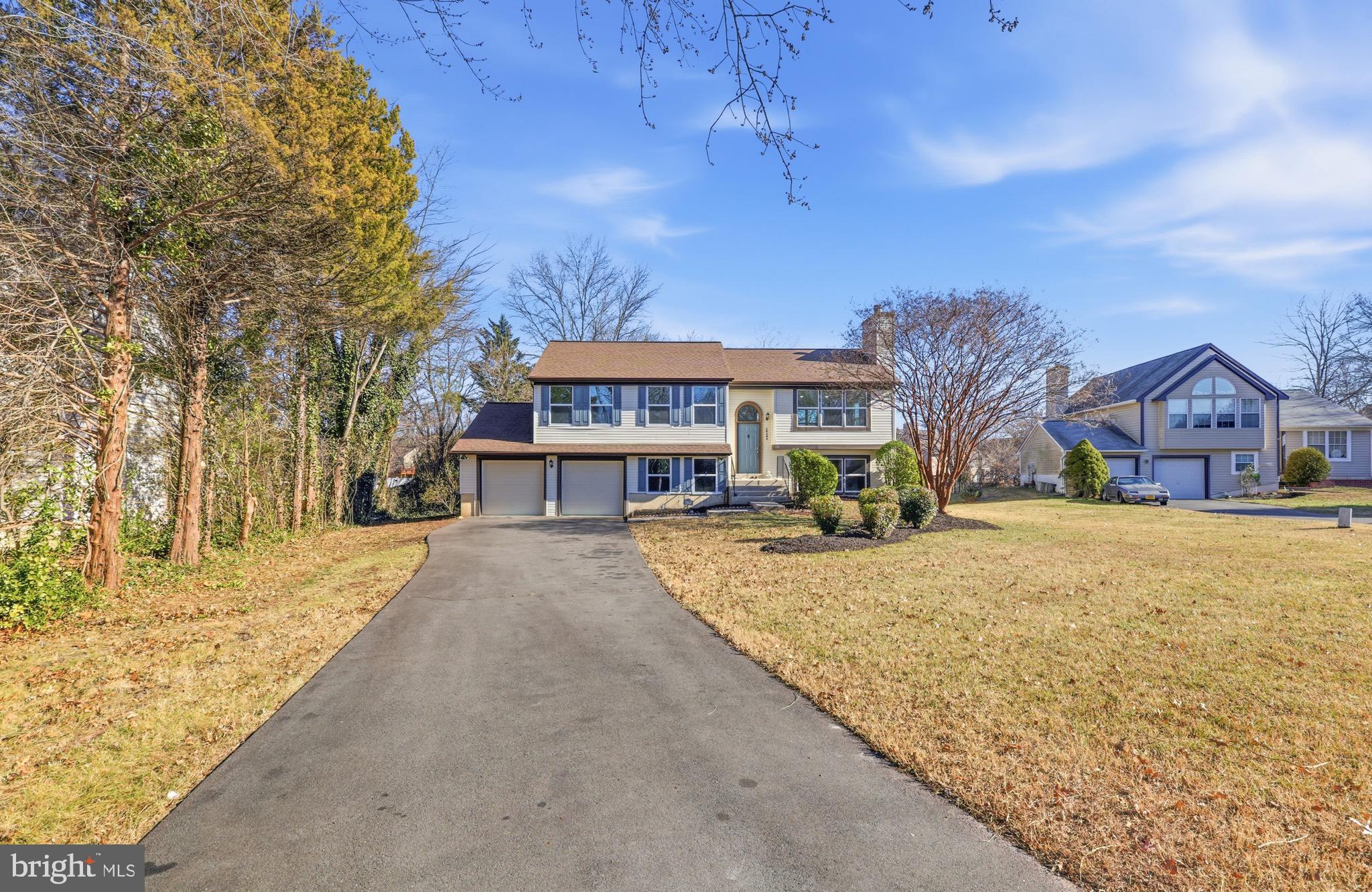 10395 Janja Court Manassas, VA 20110 - Photo 2 of 44 a view of house with outdoor space and sitting area