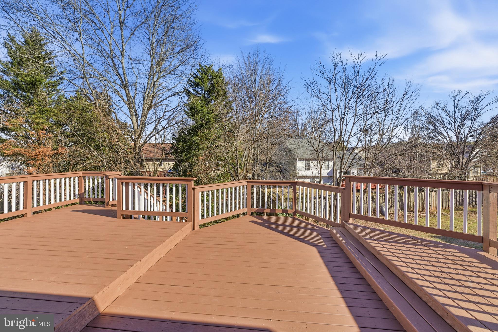 10395 Janja Court Manassas, VA 20110 - Photo 24 of 44 a balcony with wooden floor and fence