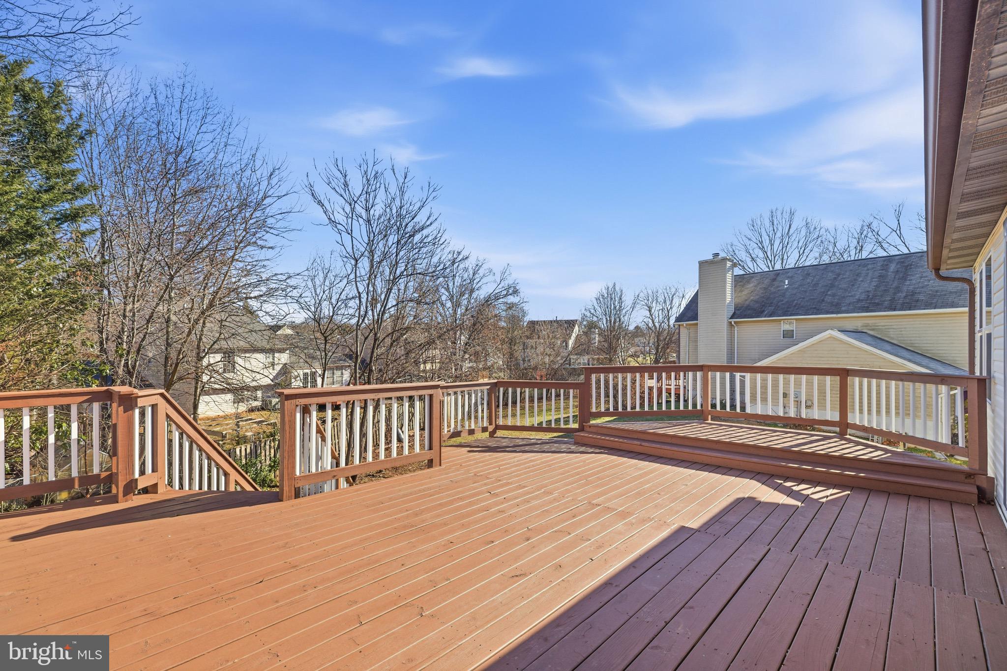 10395 Janja Court Manassas, VA 20110 - Photo 26 of 44 a view of balcony with wooden floor and fence