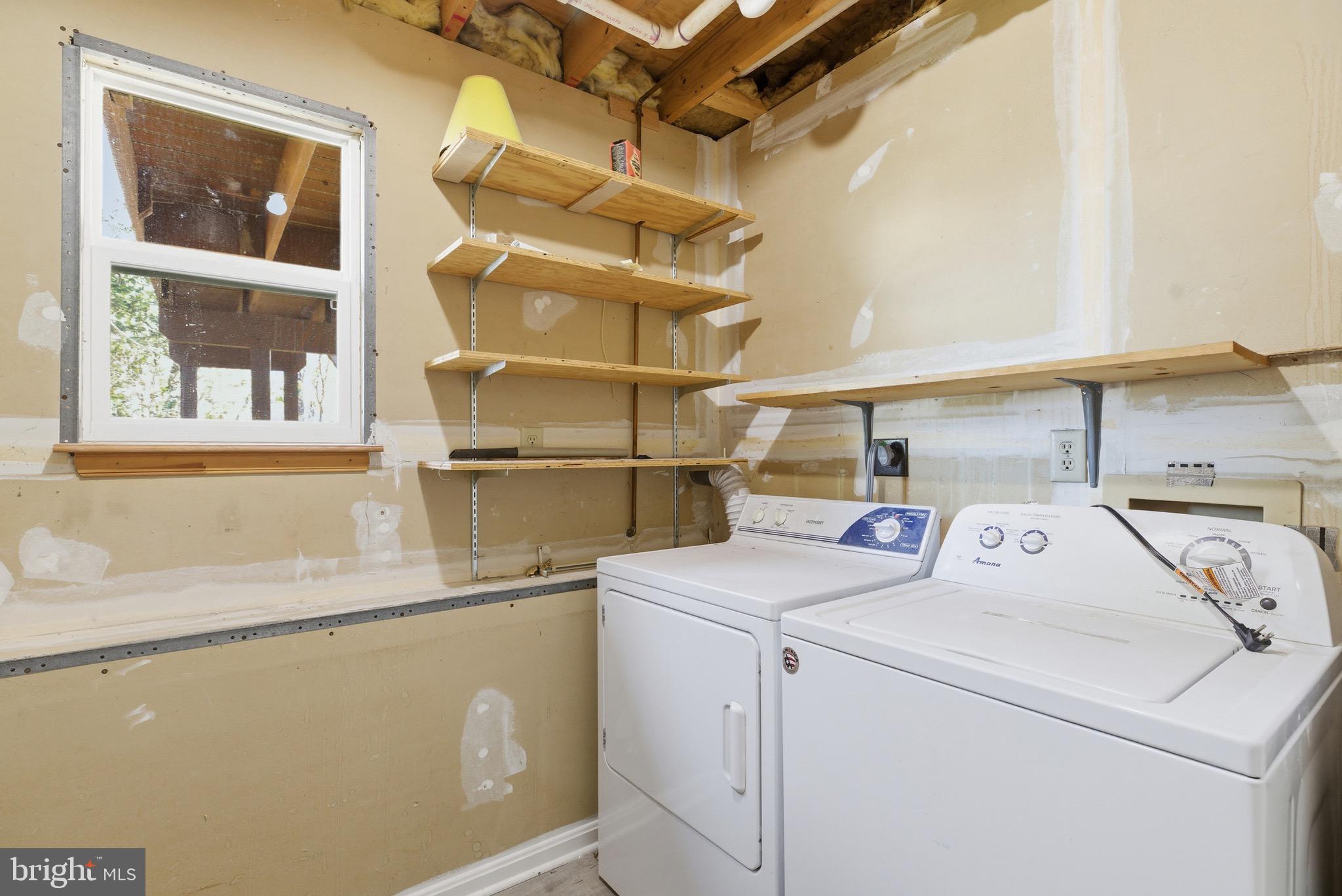 10395 Janja Court Manassas, VA 20110 - Photo 34 of 44 a utility room with dryer and washer