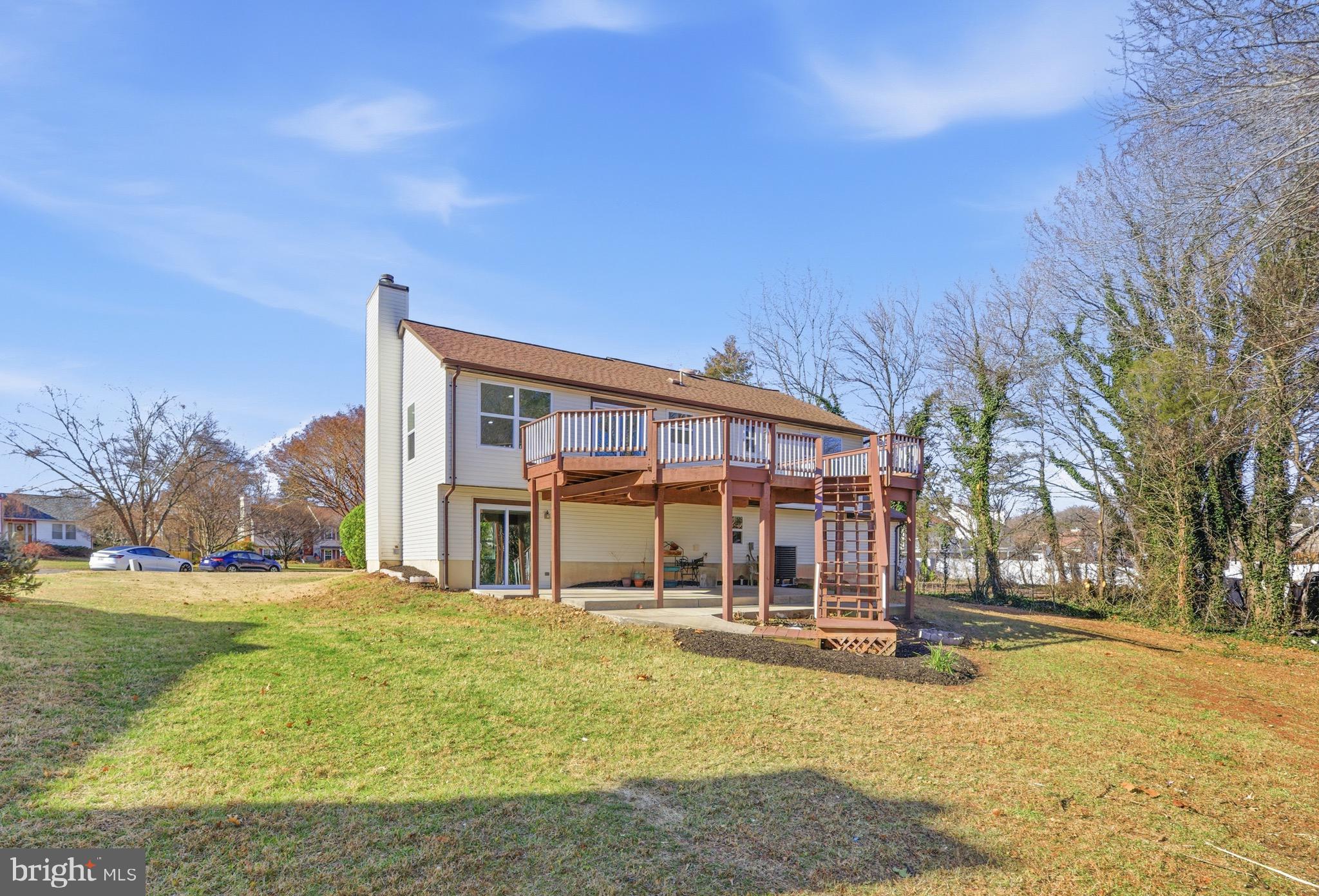 10395 Janja Court Manassas, VA 20110 - Photo 39 of 44 a view of a building with a yard