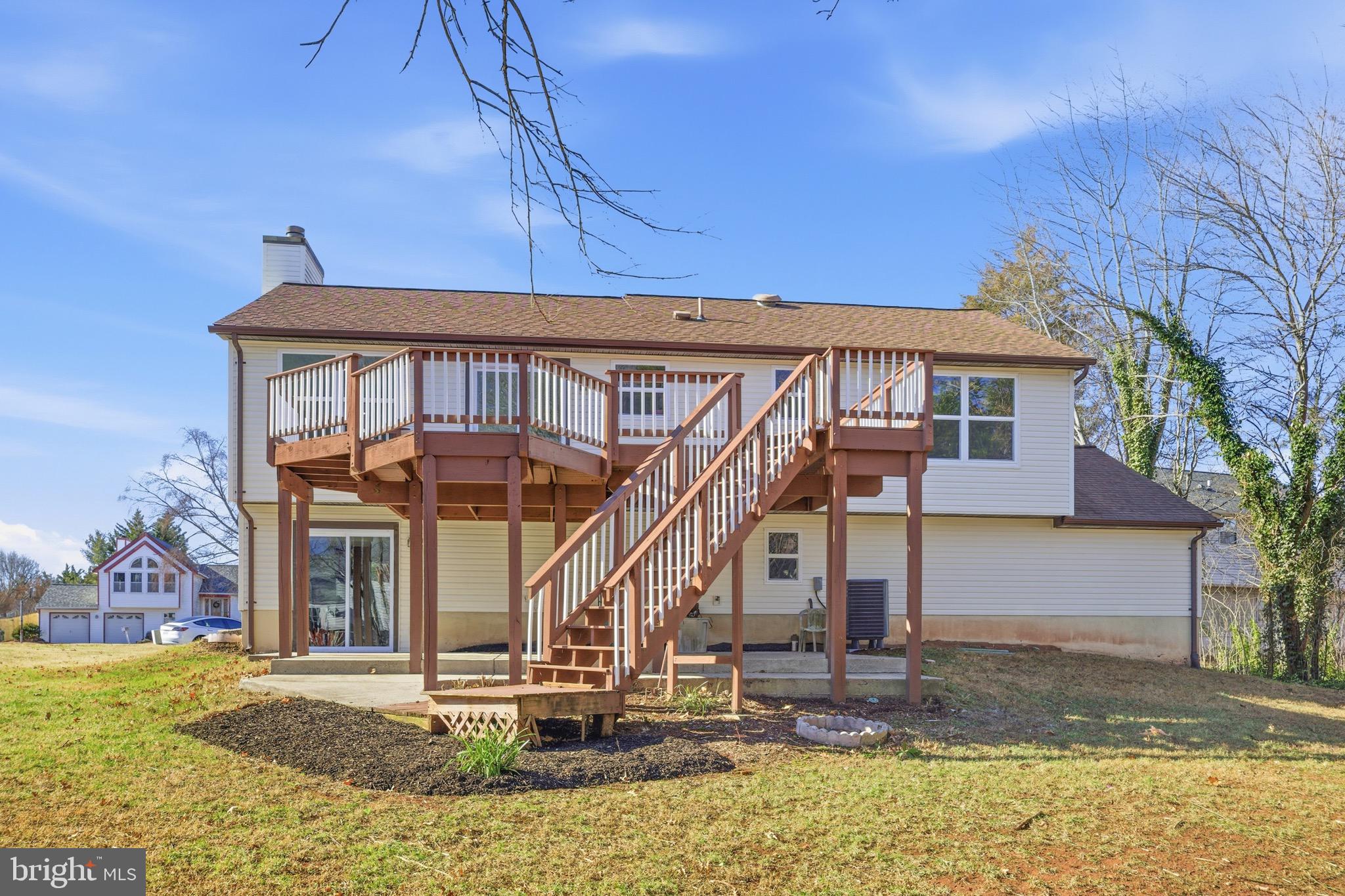 10395 Janja Court Manassas, VA 20110 - Photo 41 of 44 a front view of a house with a yard