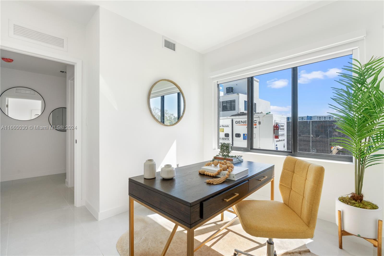 26119 Southwest 145th Court Homestead, FL 33033 - Photo 20 of 25 a view of a dining room with furniture window and wooden floor