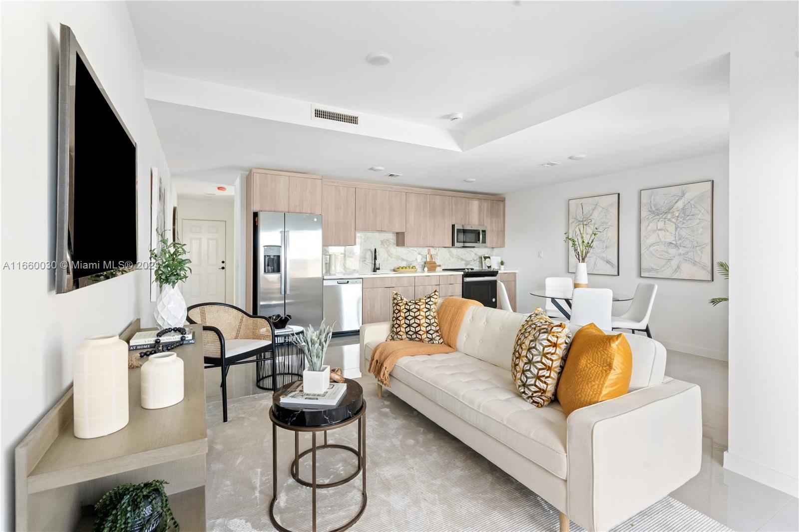 26119 Southwest 145th Court Homestead, FL 33033 - Photo 3 of 25 a living room with furniture and a flat screen tv