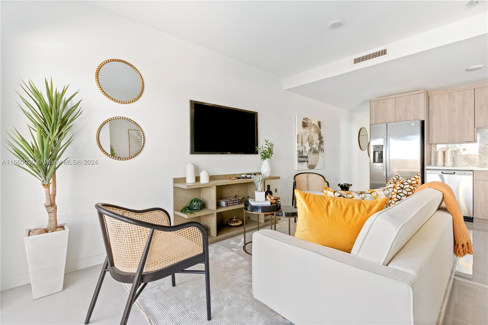 26119 Southwest 145th Court Homestead, FL 33033 - Photo 4 of 25 a living room with furniture and a flat screen tv