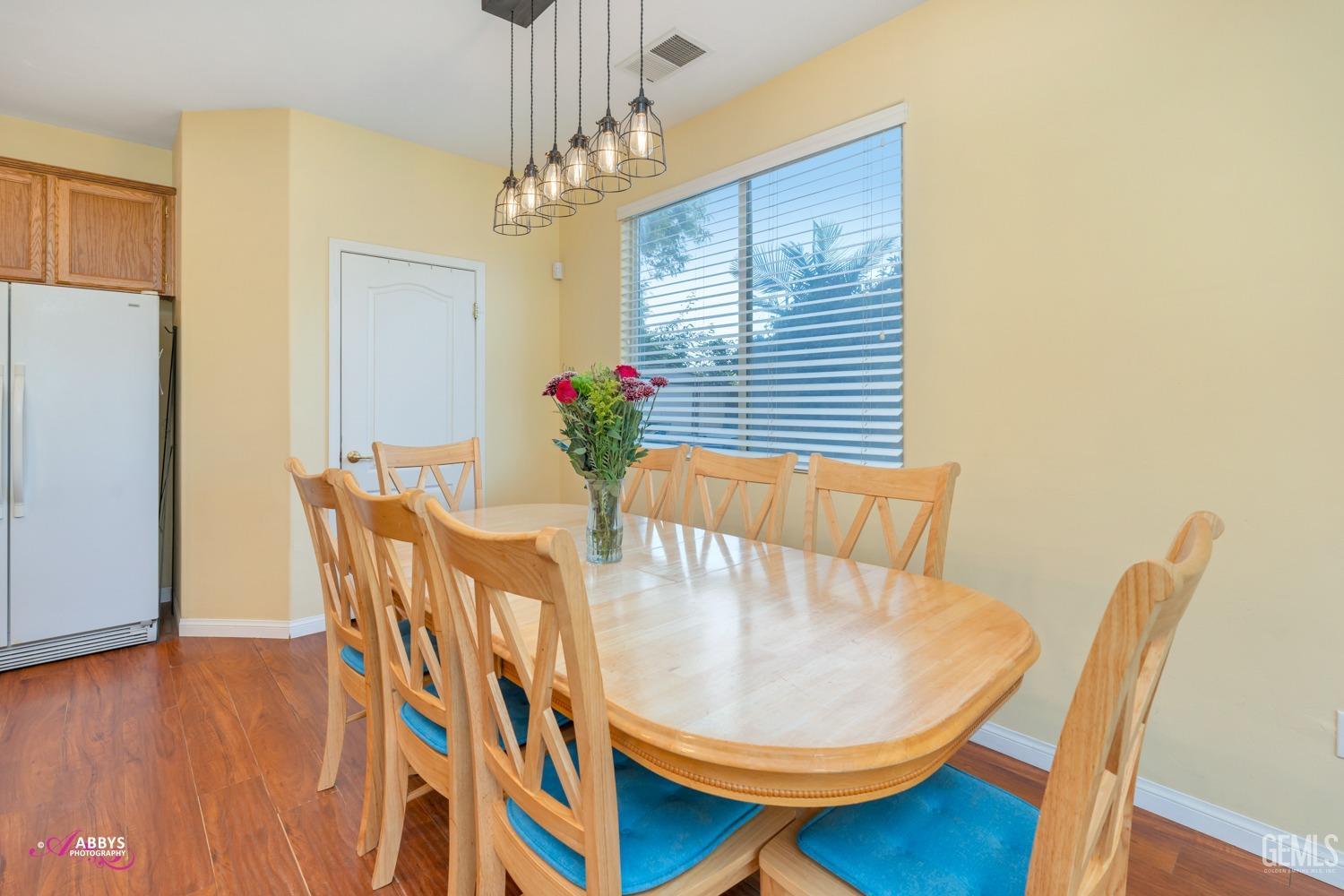 Undisclosed Address Bakersfield, CA 93312 - Photo 12 of 53 Informal dining room - door to pantry