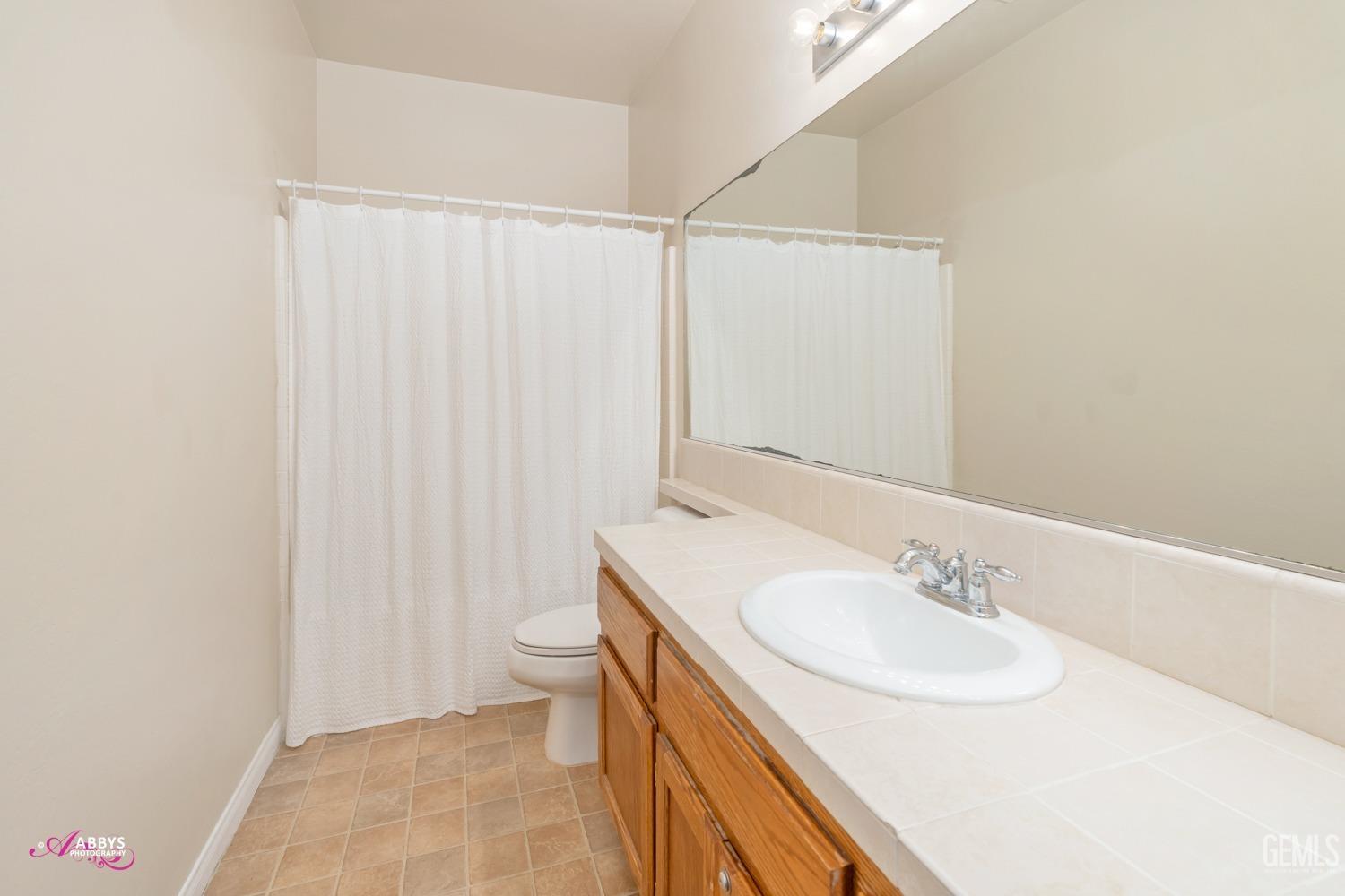 Undisclosed Address Bakersfield, CA 93312 - Photo 29 of 53 Upstairs bathroom with shower/tub