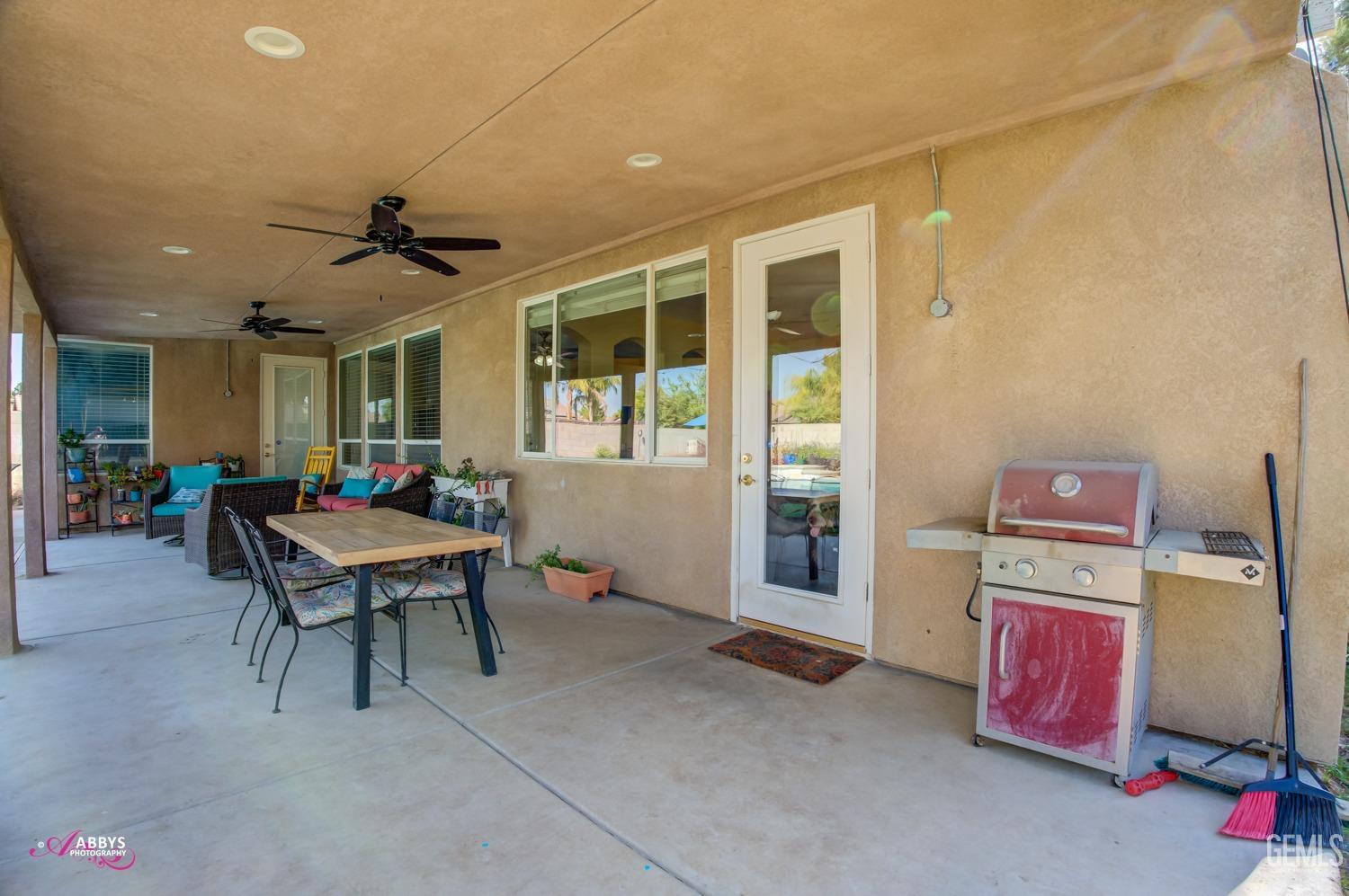 Undisclosed Address Bakersfield, CA 93312 - Photo 31 of 53 Large covered patio with 2 fans