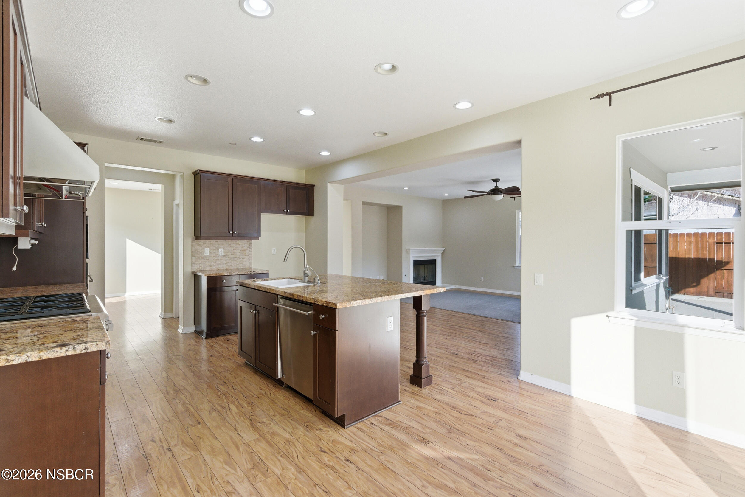 5632 Menemsha Lane Santa Maria, CA 93455 - Photo 11 of 66 a large kitchen with stainless steel appliances granite countertop a large counter top and a stove