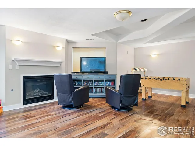 a living room with a couch and a fireplace