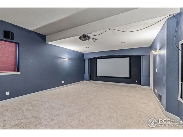 a bathroom with a sink toilet and a mirror