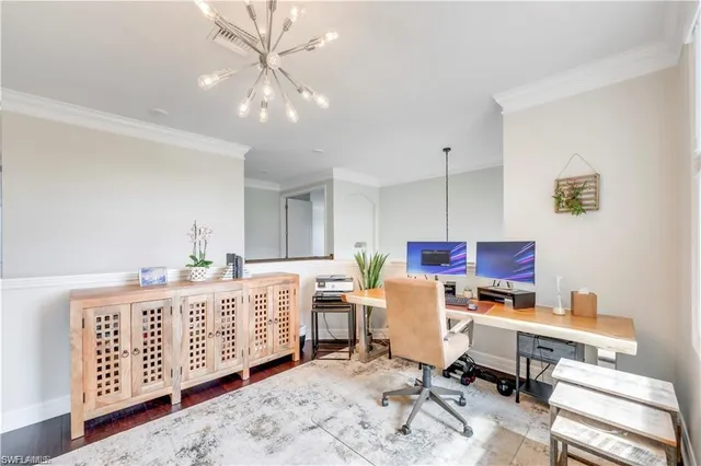 a bed room with a bed and a desk