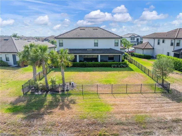 a view of a house with a swimming pool