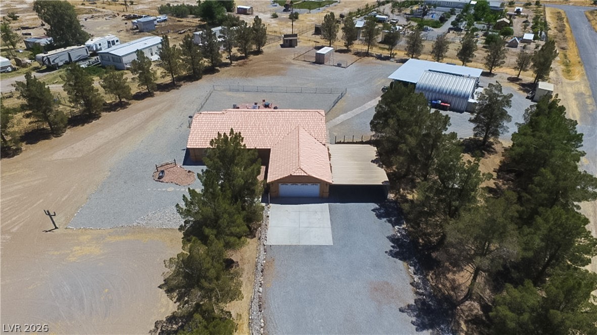 2381 Tough Boy Road Pahrump, NV 89060 - Photo 38 of 44 This desert oasis features a spacious property with ample parking and privacy.