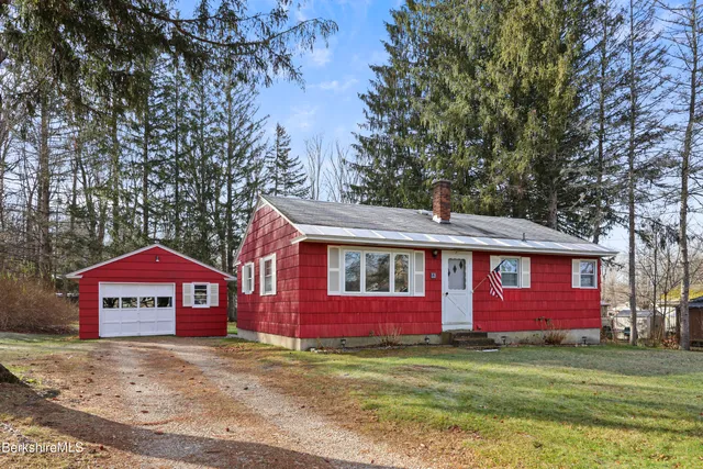 a view of front of houses with outdoor space