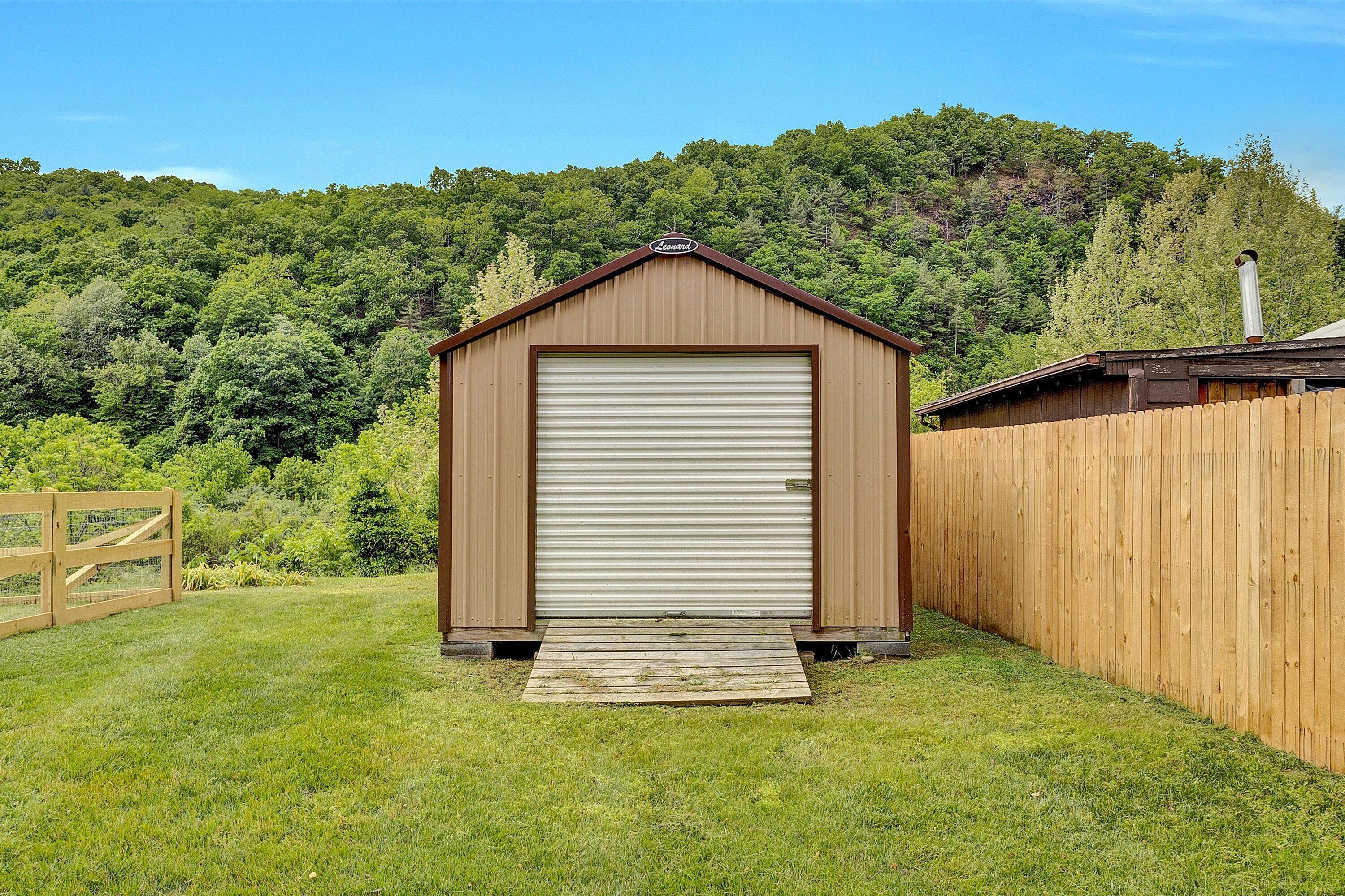 2015 Evergreen Road Covington, VA 24426 - Photo 42 of 46 a view of a backyard with a garden