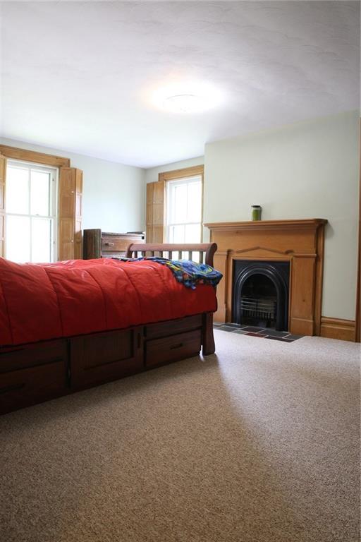 3990 Remaley Road Murrysville, PA 15668 - Photo 18 of 25 Bedroom with a Decorative Fireplace