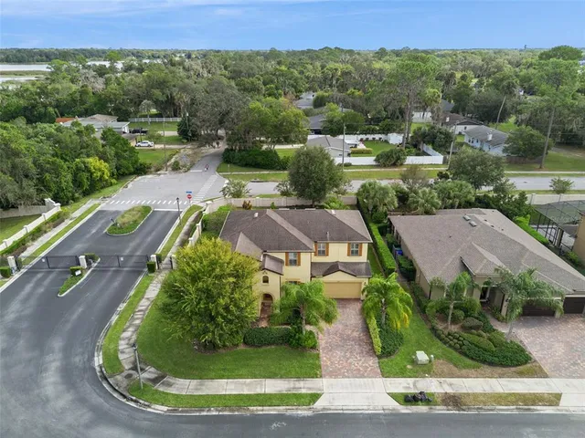 a view of a swimming pool with a yard
