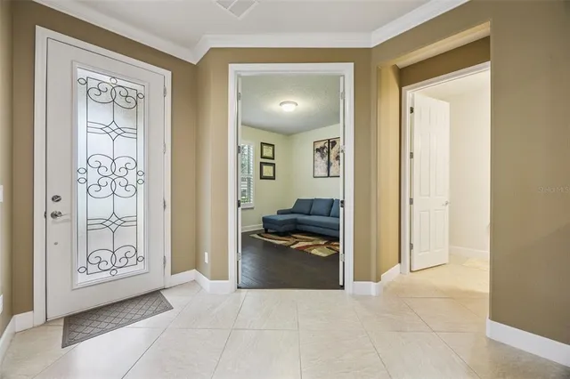 a view of livingroom with furniture and windows