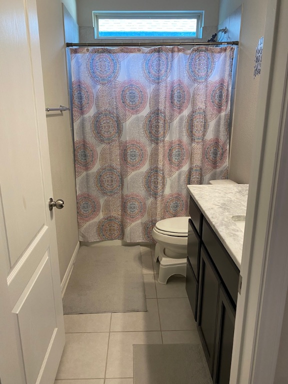 2034 Brisbane Way Bryan, TX 77807 - Photo 12 of 26 a bathroom with a granite countertop sink toilet and shower