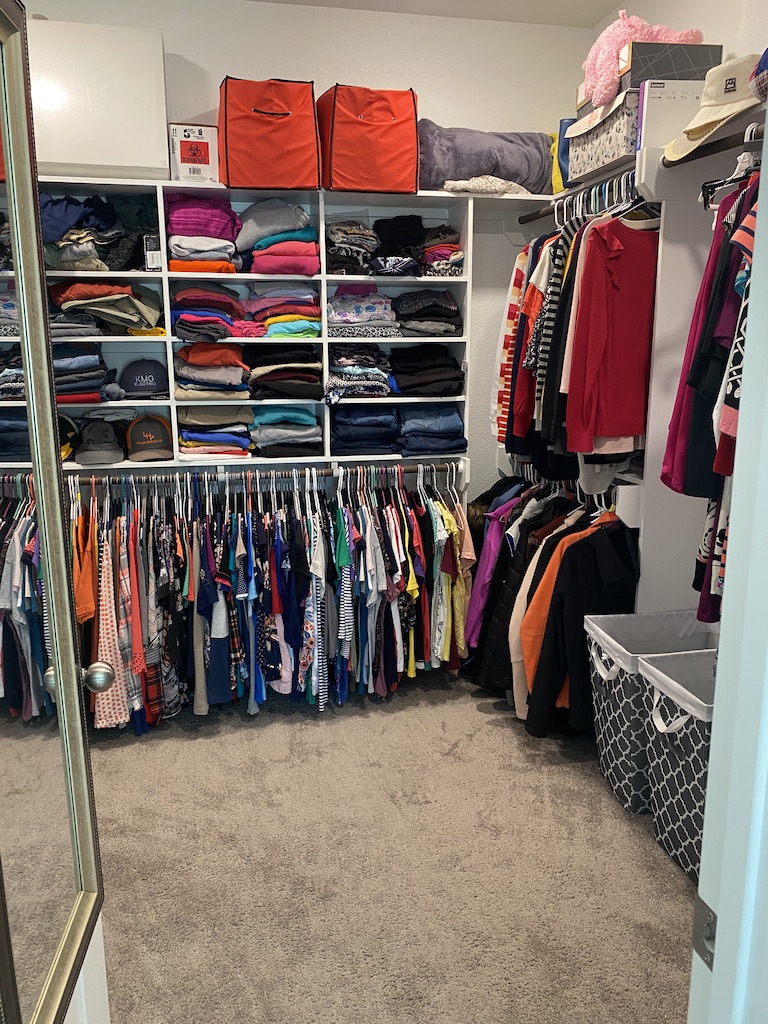 2034 Brisbane Way Bryan, TX 77807 - Photo 22 of 26 a view of walk in closet with clothes