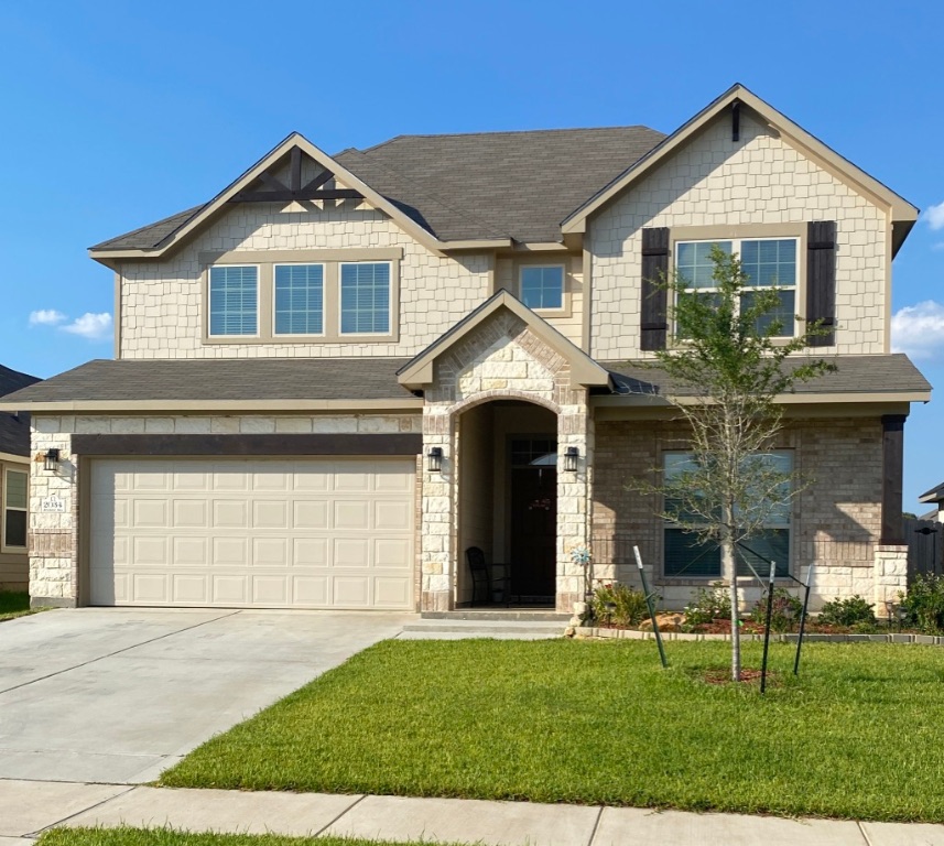 2034 Brisbane Way Bryan, TX 77807 - Photo 26 of 26 a front view of a house with a yard