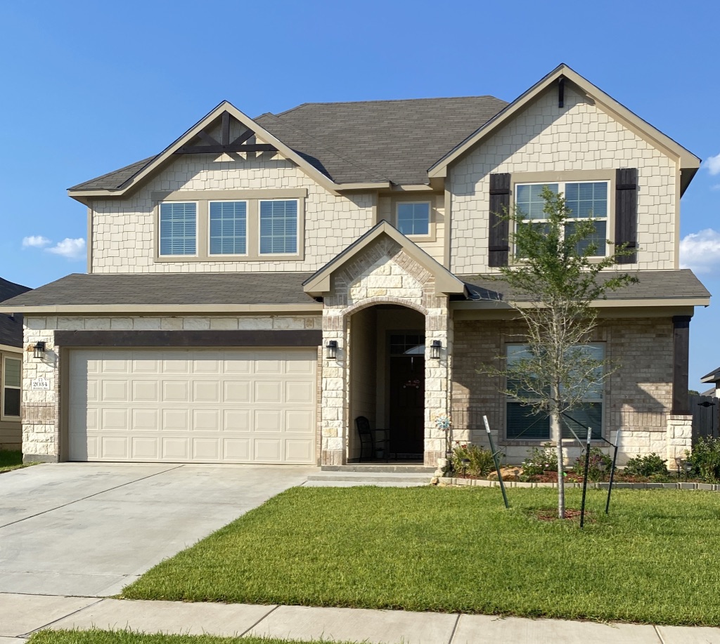 2034 Brisbane Way Bryan, TX 77807 - Photo 26 of 26 a front view of a house with a yard