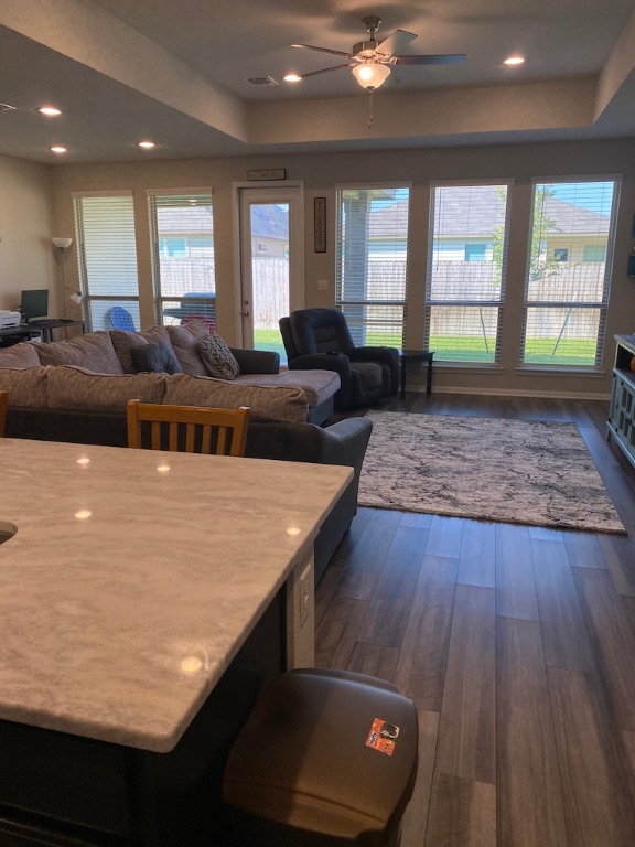 2034 Brisbane Way Bryan, TX 77807 - Photo 5 of 26 a living room with large window and wooden floor