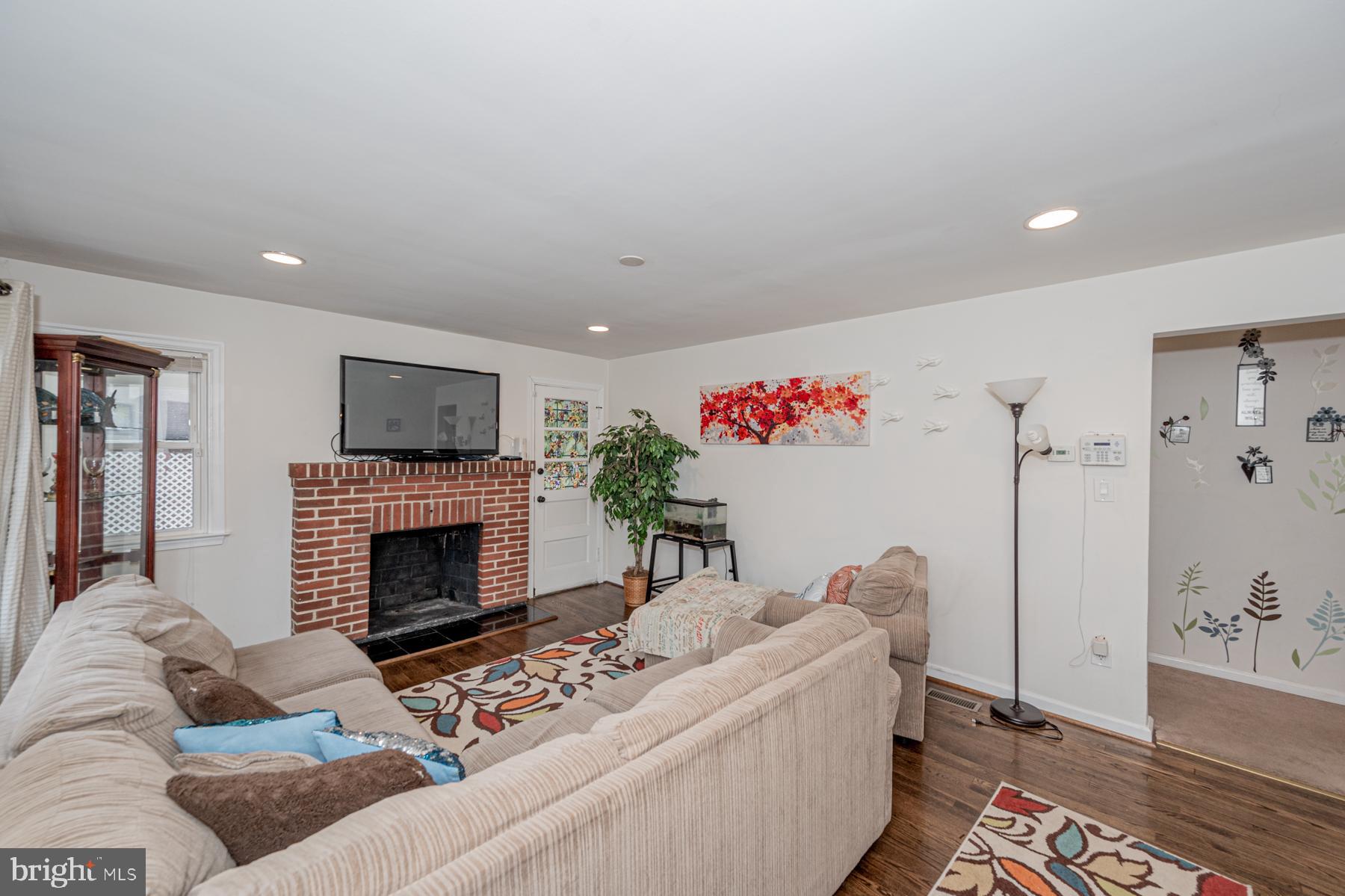 3 Cedarhill Road Randallstown, MD 21133 - Photo 13 of 37 Living Room- Fireplace is real but Is for show