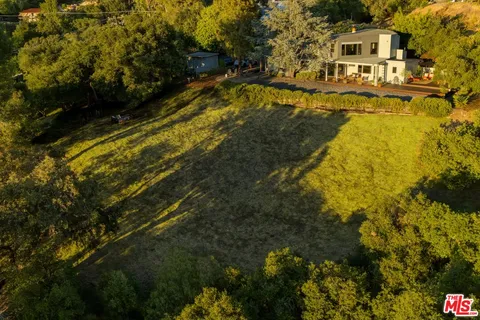 a view of mountains in the middle of a city