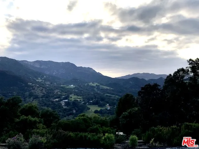 a view of mountains and mountain in back