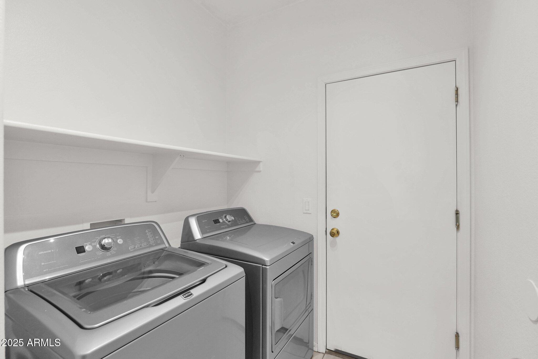 2190 East Augusta Avenue Chandler, AZ 85249 - Photo 17 of 35 a utility room with dryer and washer