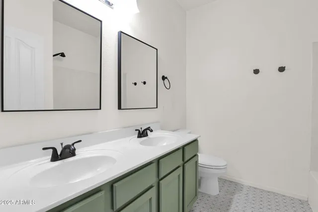 a bathroom with a sink and a toilet
