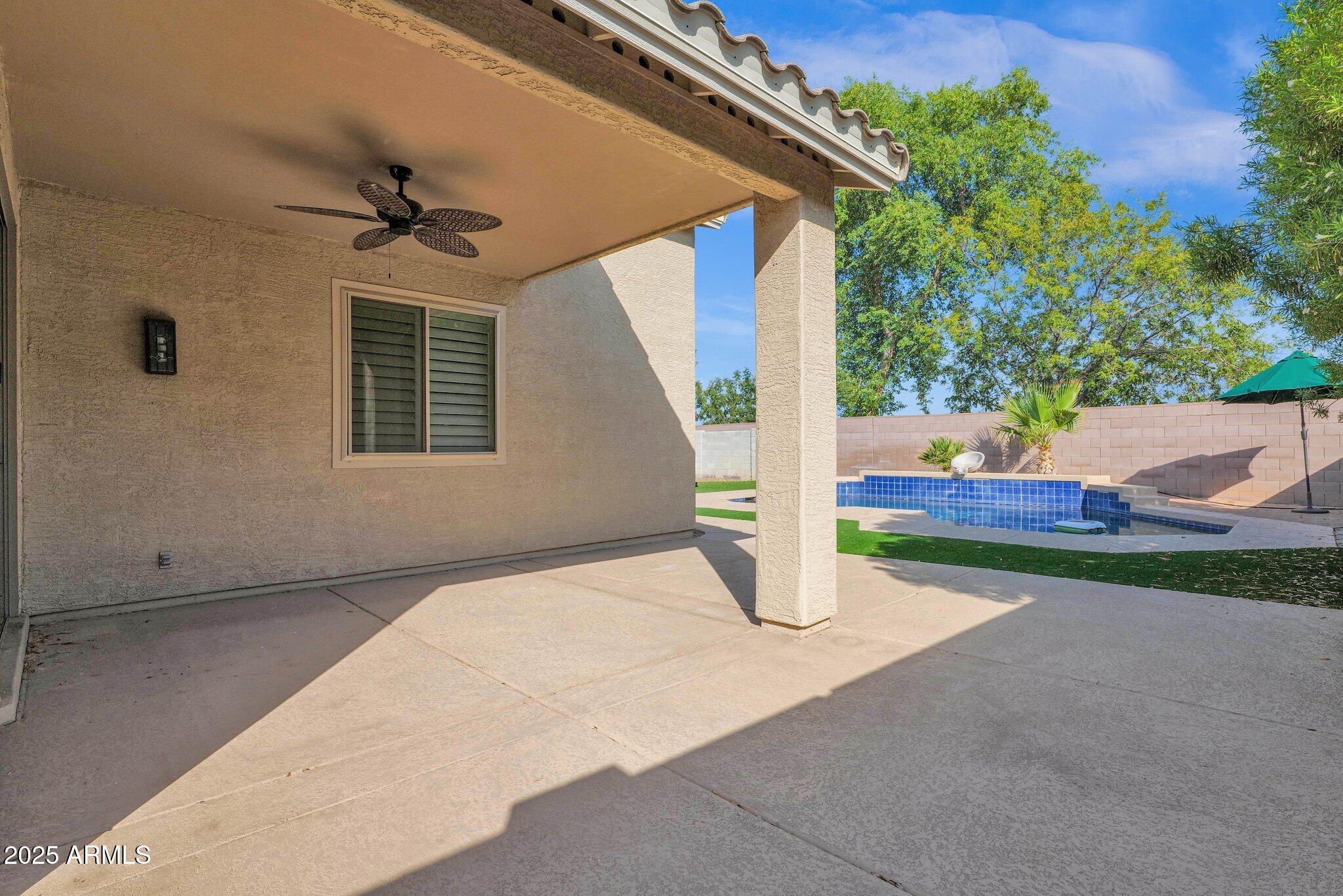 2190 East Augusta Avenue Chandler, AZ 85249 - Photo 27 of 35 a view of a house with porch and garden