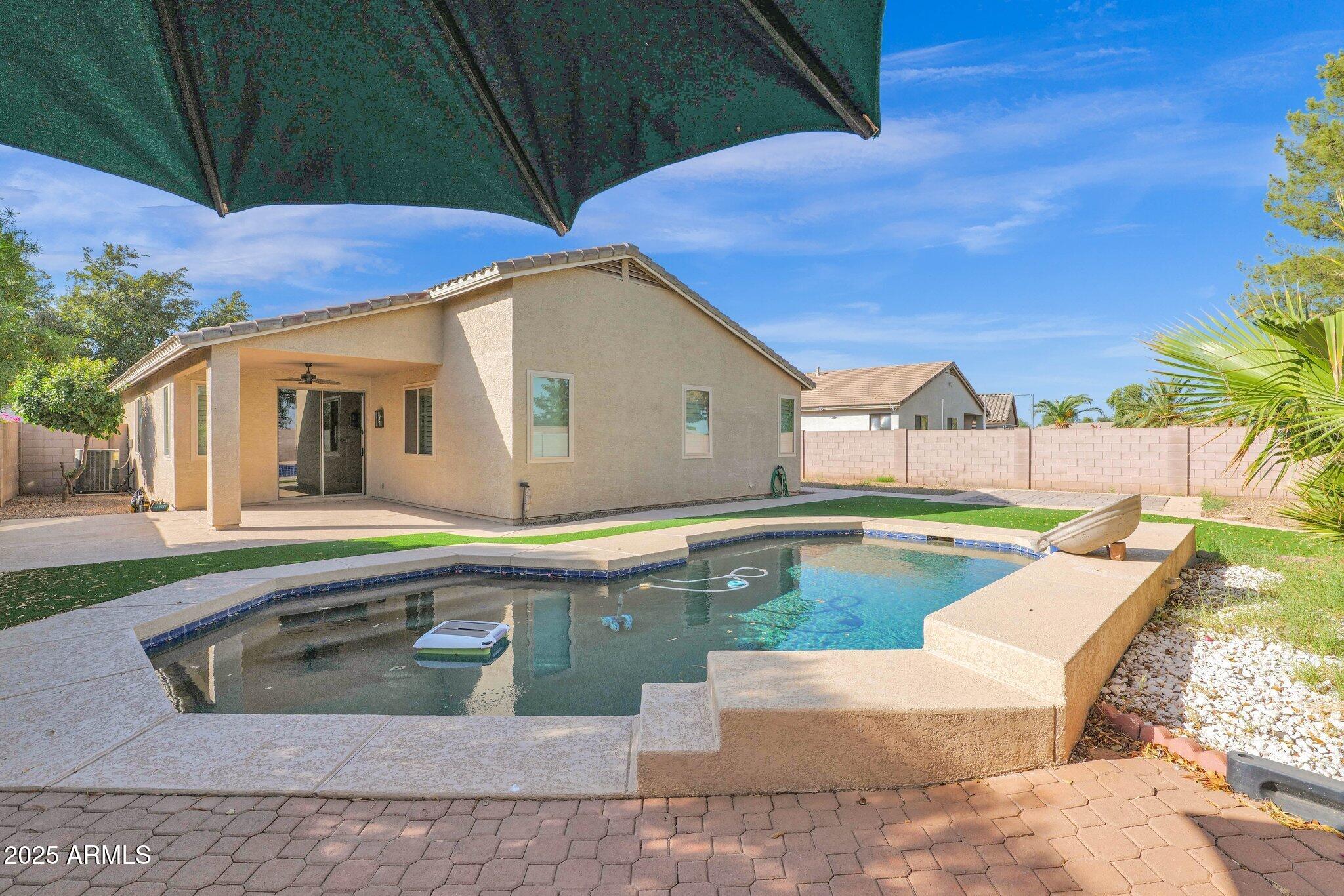 2190 East Augusta Avenue Chandler, AZ 85249 - Photo 29 of 35 a view of swimming pool with a lounge chair