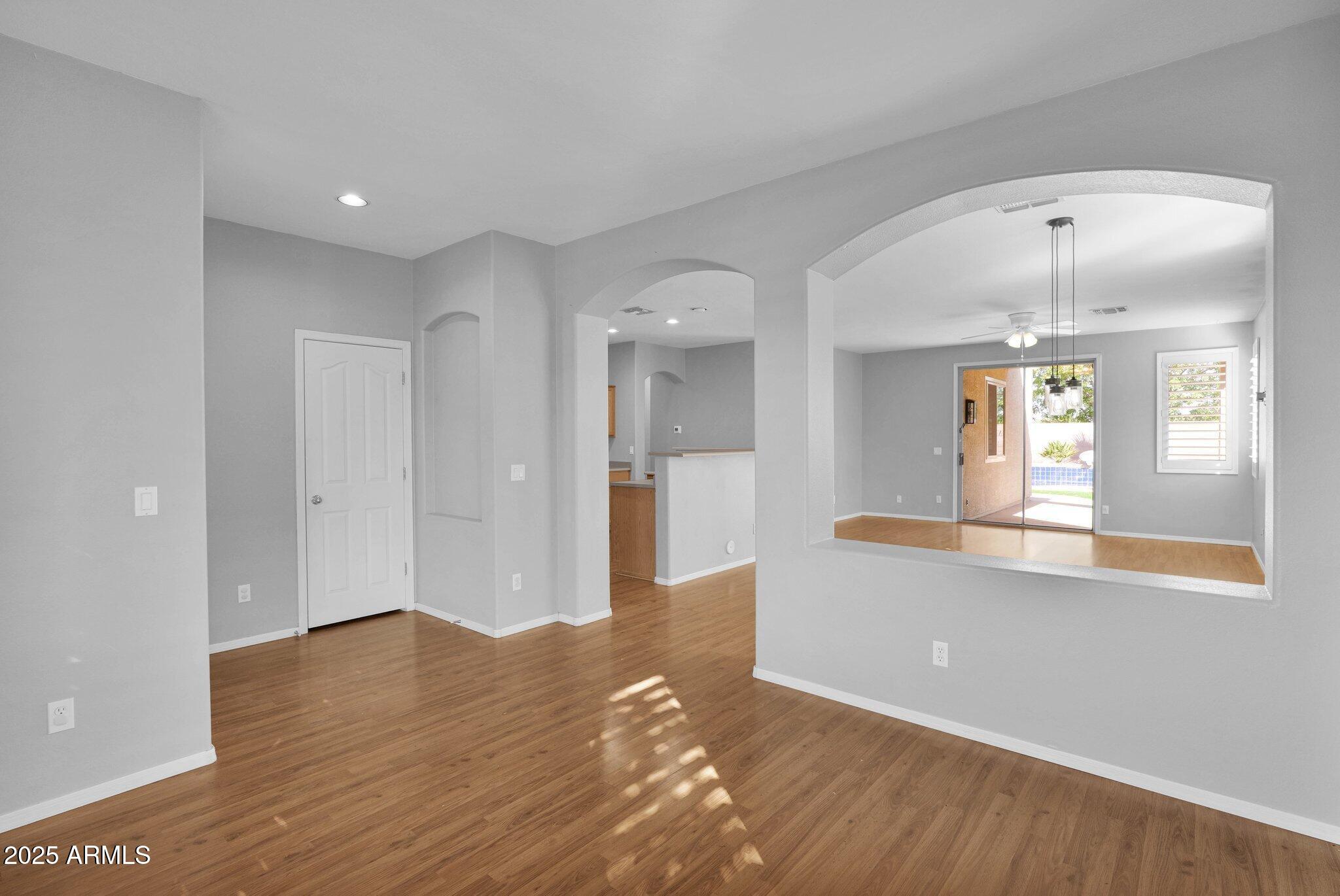 2190 East Augusta Avenue Chandler, AZ 85249 - Photo 5 of 35 a view of a living room and wooden floor