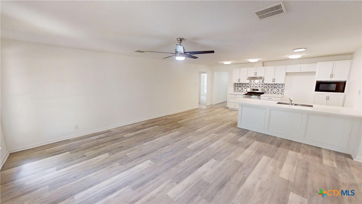 4118 Ermine Trail Temple, TX 76504 - Photo 11 of 31 a view of a kitchen with marble kitchen counter top space a sink and dishwasher