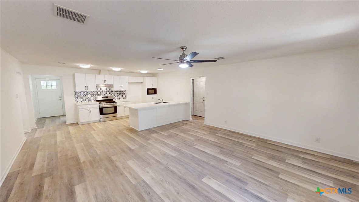 4118 Ermine Trail Temple, TX 76504 - Photo 12 of 31 a view of a livingroom with a hardwood