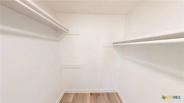 a view of small space with racks on the wall