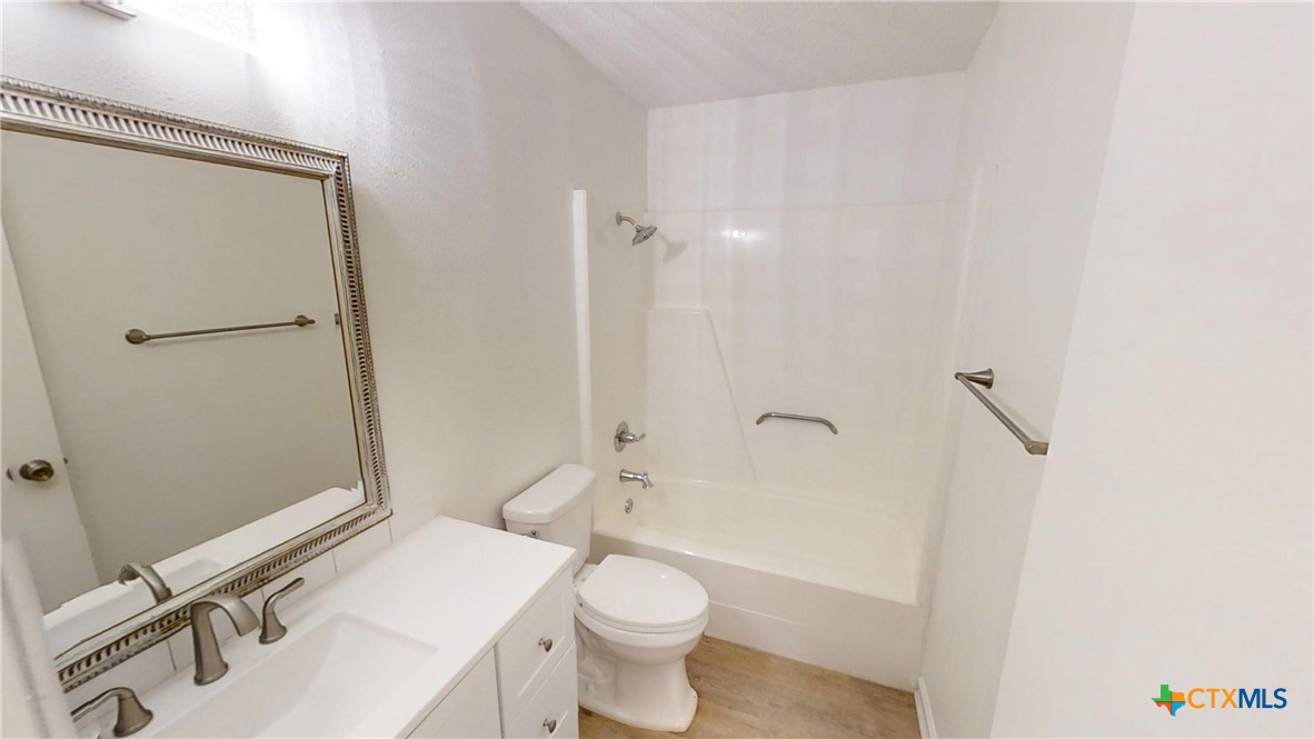 4118 Ermine Trail Temple, TX 76504 - Photo 22 of 31 a bathroom with a sink a toilet and shower