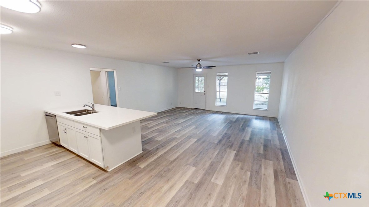 4118 Ermine Trail Temple, TX 76504 - Photo 6 of 31 a white room with wooden floor